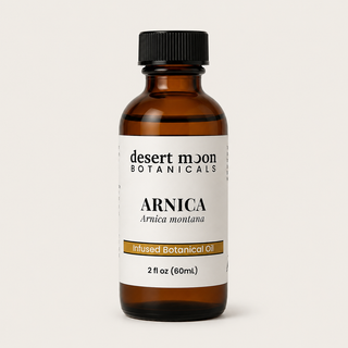 Desert Moon Botanicals Arnica Infused Botanical Oil in a 2 oz amber bottle