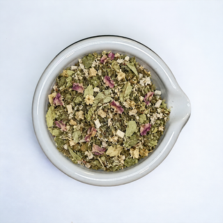 Loose-leaf Summer Soother Tea with linden, marshmallow root, rose petals, and lemon balm.
